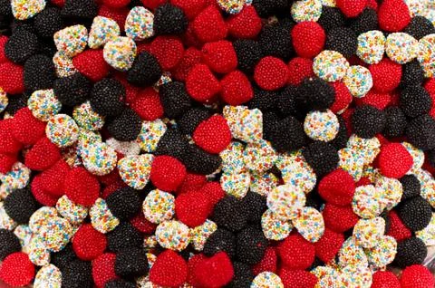 A scattering of multi-colored marmalade sweets in a store Stock Photos