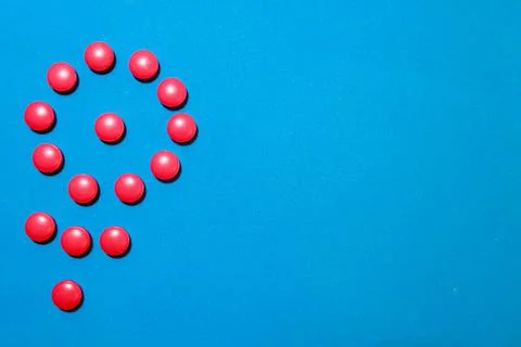 A scattering of red tablets Stock Photos