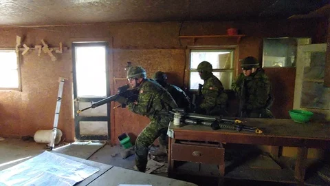 Scenario of a high risk forced take down performed by Canadian army soldiers Stock Footage 126940200