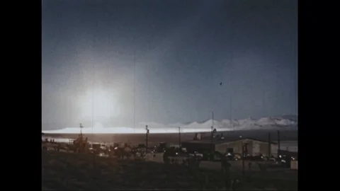 Scene of atomic bomb explosion in desert area of Nevada - 1953 Stock Footage 106047376