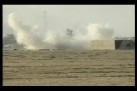 Scene of blowing smoke in the distance at Fallujah, Iraq - 2004 Stock Footage 108262882