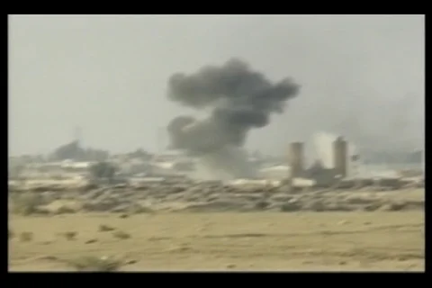 Scene of blowing smoke in the distance at Fallujah, Iraq - 2004 Stock Footage 108262895