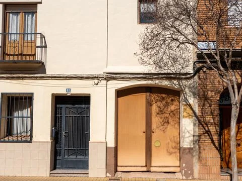 Scene captures two distinct building facades standing side by side. One has b Stock-Fotos