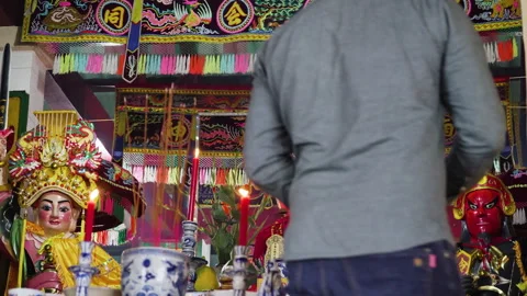 Scene of devout man offering incense at Whale Temple altar. Close up, Video stock 208274474