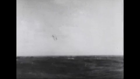 Scene of Dolphin jumping in ocean, ship sailing through stormy waves - 1933-37 Stock Footage 98158826
