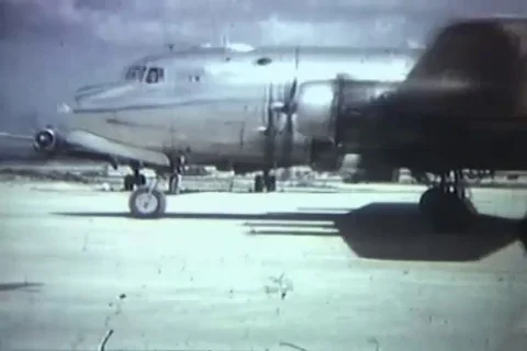 Scene of Douglas C-54 Skymaster taxies on runway at Atsugi Airstrip - 1945 Stock Footage 112181593