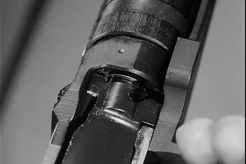 Scene of extractor process of the bullets in M14 rifle - 1960 Stock Footage 108042715