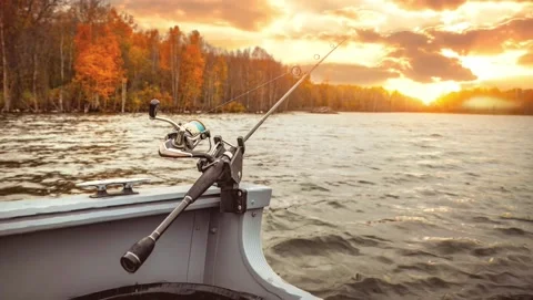 Scene of fishing pole from boat on lake , Stock Video