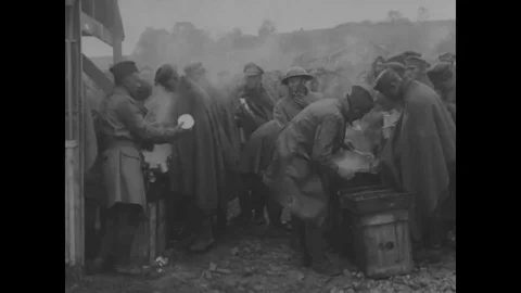 Scene of German prisoner eats and distribute food - 1918 Vídeo Stock 98959431