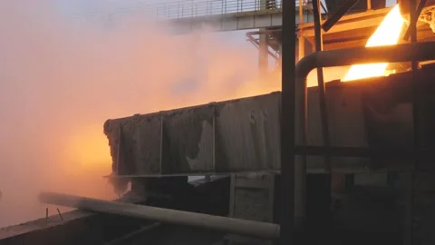  The scene of  high-temperature slag liquid spews out of  furnace Stockbeeldmateriaal 130885528