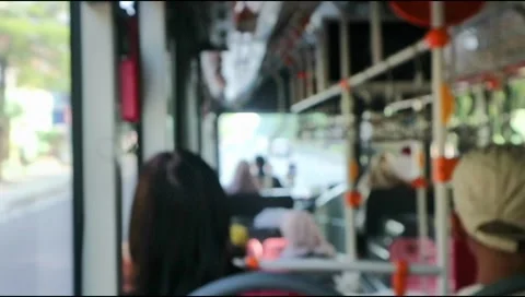 Scene inside a tram, bus, subway,moving on the road .Defocus.Video blurred Stock Footage 303570914