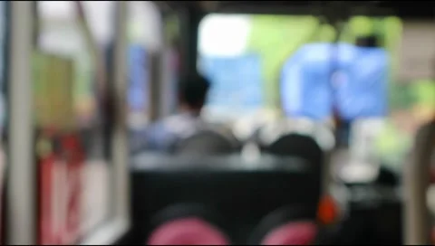 Scene inside a tram, bus, subway,moving on the road .Defocus.Video blurred Stock Footage 303571021