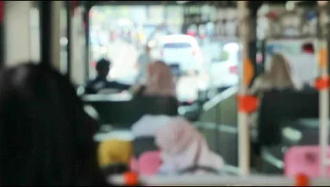 Scene inside a tram, bus, subway,moving on the road .Defocus.Video blurred Stock Footage 303571189