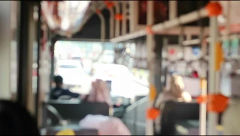 Scene inside a tram, bus, subway,moving on the road .Defocus.Video blurred Stock Footage 303571190