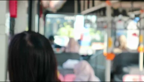 Scene inside a tram, bus, subway,moving on the road .Defocus.Video blurred Stock Footage 303571297