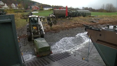 Scene of loading equipment onto landing craft - 2018 Video stock 106138963