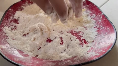 A scene of making crispy mushrooms. Coating the mushrooms with flour. Stock Footage 322787210
