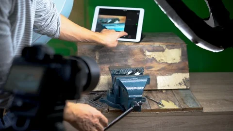 Scene Making - Vice and Remote via Tablet Stock Footage 98559885