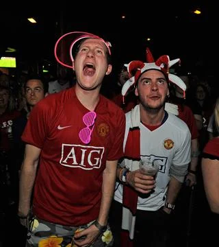 Scene At Manchester City Centre Bar 'brannigans' As Man Utd Supporters Watch The Stock Photos