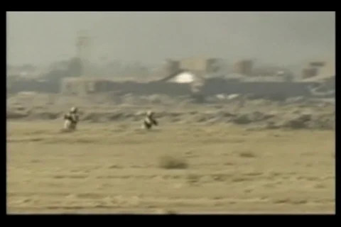 Scene of Marines exiting the building and taking cover at Fallujah, Iraq - 2004 Stock Footage 108262928