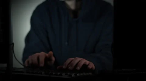Scene of a masked Anonymous computer hacker Stock Footage 60599514