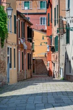 Scene with the narrow streets and the old medieval red brick buiuldings in .. Foto stock
