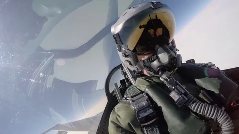 Scene of plane cockpit of pilot hover in mid-air during Arctic Challenge - 2015 Stock Footage