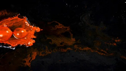 Scene of red ink getting injected in dark space Stock Footage 85641155