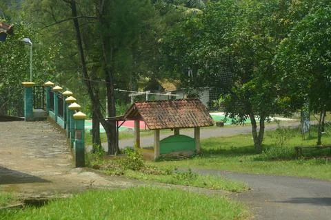 Scene a shack on the side of the road close to the forest. looks clean but .. Stock Photos