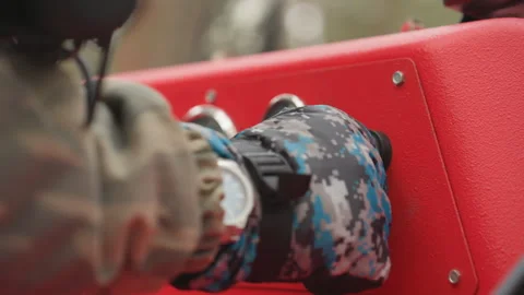 Scene showing rider preparing offroad ATV with gauges and switches. Detailed Stock Footage 334784619