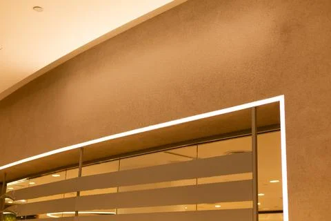The scene shows an empty storefront with blank space for a logo or sign. Th.. Stock Photos