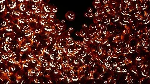 The scene shows a large number of jack-o-lanterns filling the screen, background Stock Footage 345263838