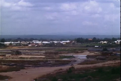 Scene of smoke rising from rocket explosions and aerial view of forest - 1972 Stock Footage 106060463