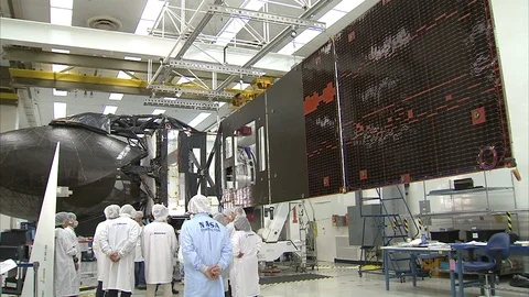 Scene of Solar Array Deployment in Tracking and Data Relay Satellites - 2013 Stock Footage 112273088