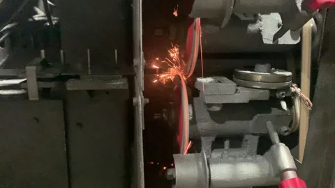 Scene of sparks during the process of sharpening the blade Stock Footage 315432086