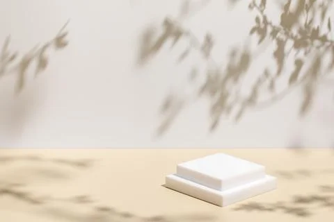 Scene with square podium on beige background and shadows Stock Photos