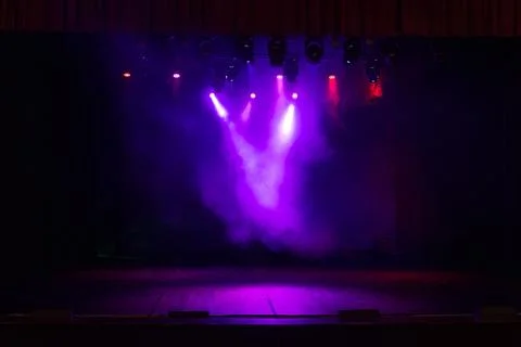 Scene, stage light with colored spotlights and smoke 스톡 사진