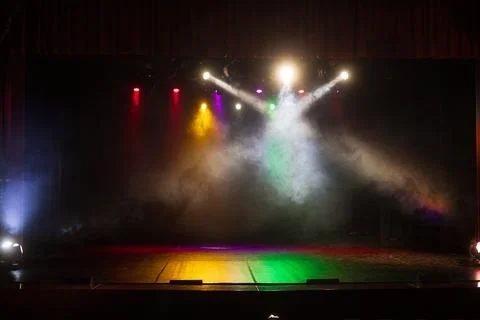 Scene, stage light with colored spotlights and smoke Stock Photos