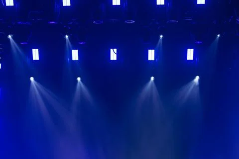 Scene, stage light with colored spotlights and smoke Foto stock