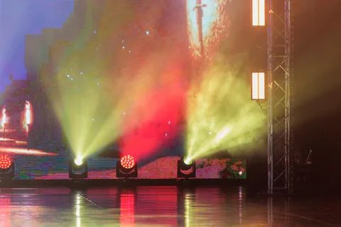 Scene, stage light with colored spotlights and smoke Stock Photos