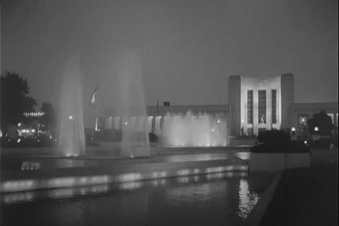 Scene of state fair at night and kids on amusement rides - 1963 Stock Footage 105687085