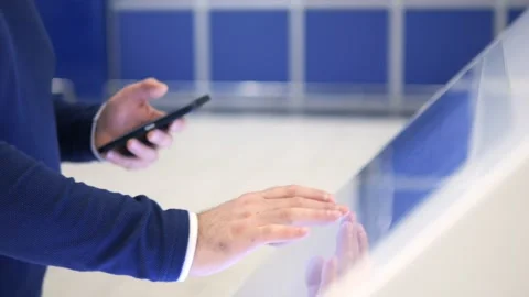 The scene suggests that the man is multitasking Stock Footage 299559488