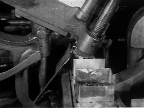 Scene of tea being filled in container by machine - 1920 Stock Footage 109207398