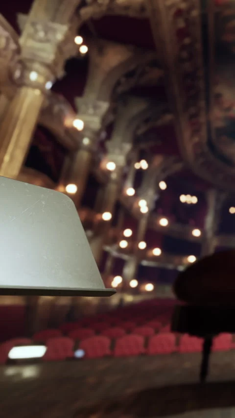 Scene from a theater with blurred background and lamps on stage Stock Footage 338381828