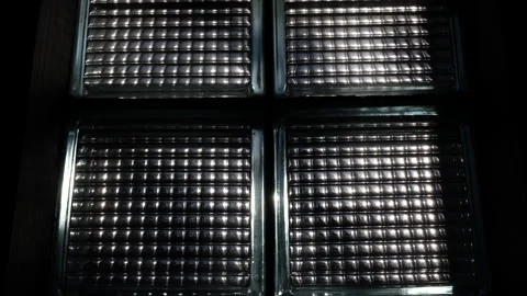 Scene of tree blowing in wind through window. Video stock 237900489