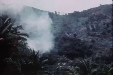 Scene of tunnel explosion in forest, soldier talks over radio - 1967 Stock Footage 112196398