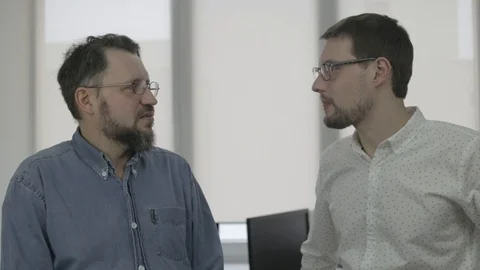 Scene of two men talking in office Stock Footage 97351722