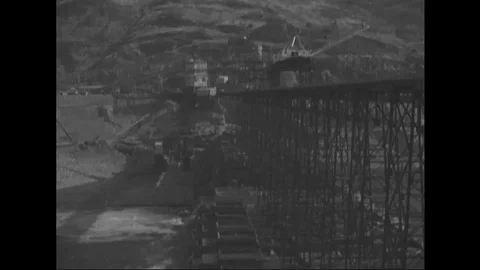 Scene of water flowing through newly constructed Grand Coulee Dam - 1938 - 1939 Stock Footage 103595121