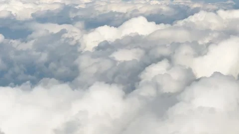Scenery above fluffy clouds, flying in the sky Stock Footage 328485454