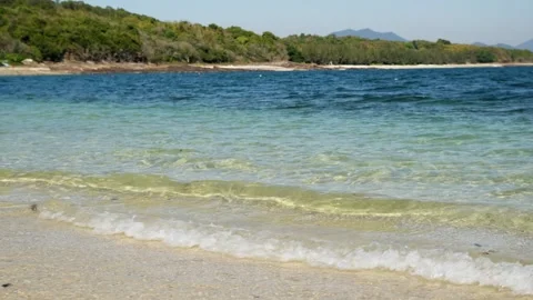 Scenery of beach shore and wave in sunny day in Tung Ping Chau, Hong Kong - 4k Stock Footage 297870014
